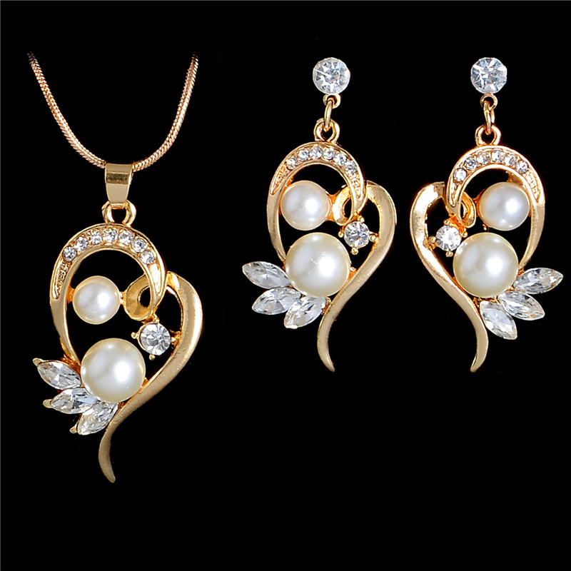 white gold pearl necklace and earring set
